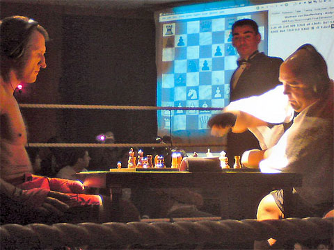 Chessboxing, amateur boxing and chess board game being played