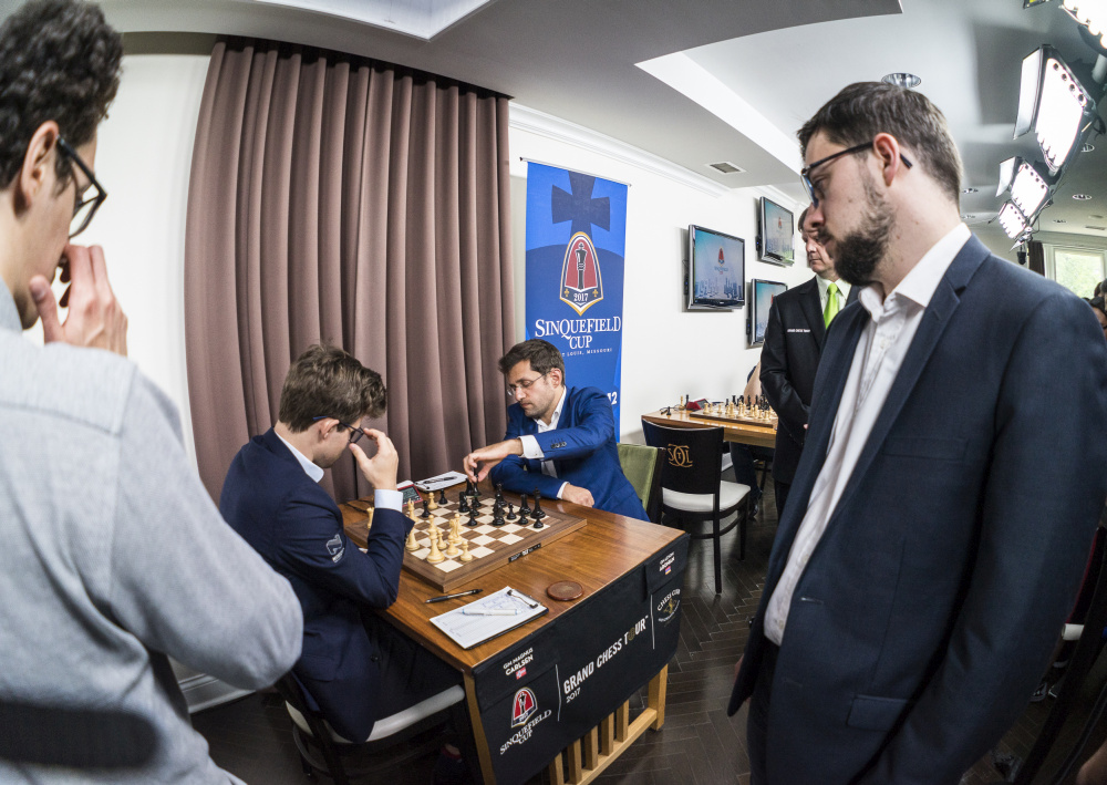 Vachier-Lagrave watching Carlsen-Aronian