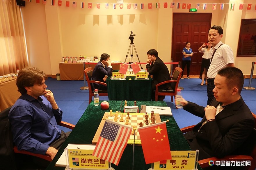 Wei Yi playing against Samuel Shankland in the second round of Danzhou Masters