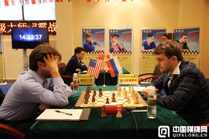 Vladimir Fedoseev and Sam Shankland during their fifth round game at the Danzhou Masters