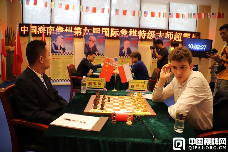 Jan Krzysztof Duda playing against Wei Yi in the final round of the Danzhou Masters