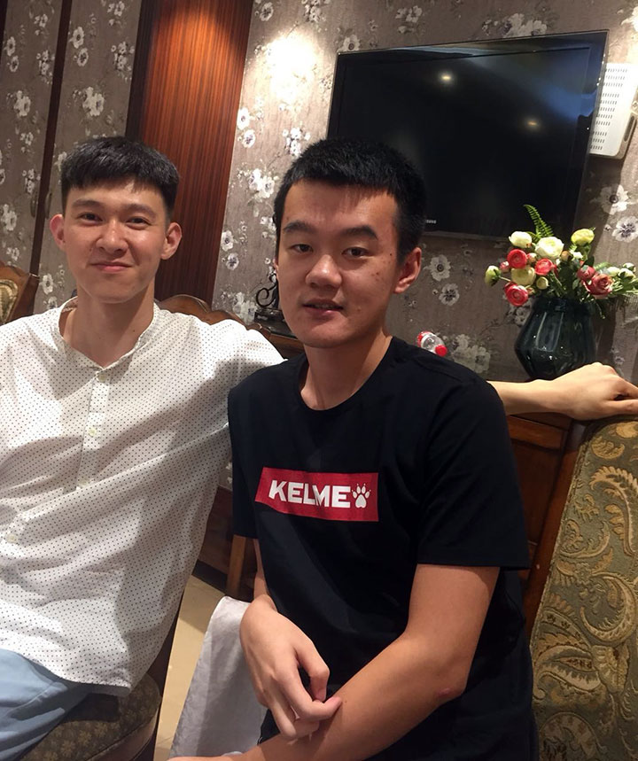 Ding at home with a friend