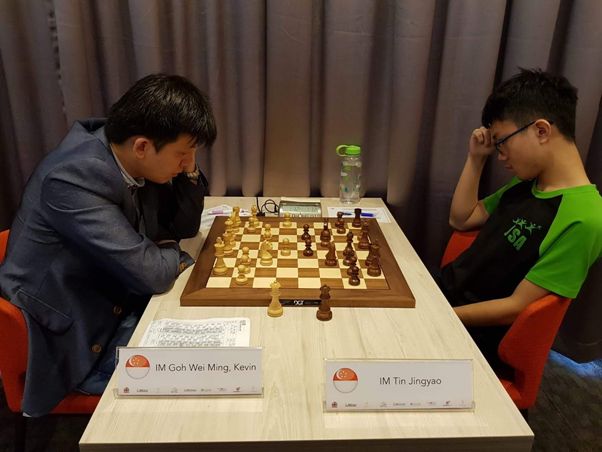 Kevin Goh playing against Tin Jingyao at the QCD-Prof Lim Kok Ann Grandmasters Invitational 2018 