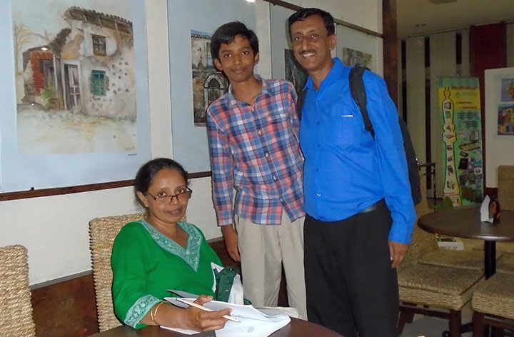 Alok Sinha and his parents