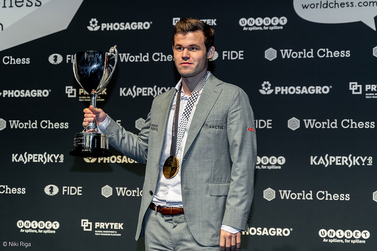 Carlsen with trophy