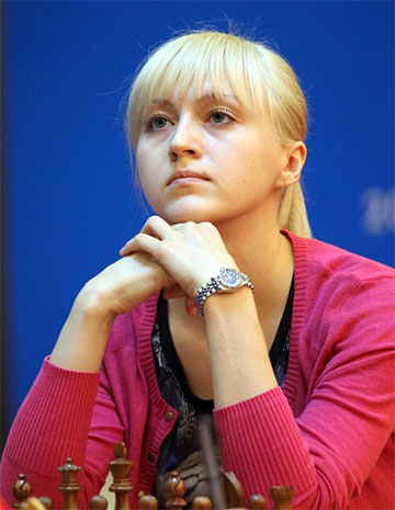 the game by star photographer (and FIDE Press Officer) Anastasiya Karlovich