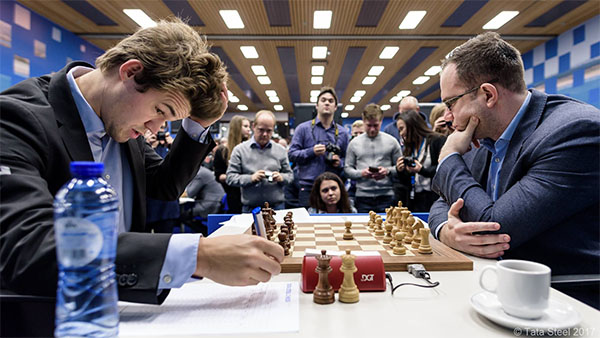 Carlsen's expression after 1.e4 d5 2.exd5 Nf6!?