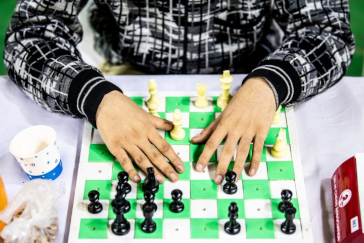 Blind Chess, An experienced player takes on an eleven year …