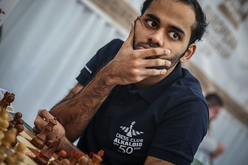 A chess player thinking during a game at a tournament