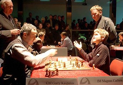 13-year-old Magnus Carlsen is bored playing with chess legend Garry Kasparov.  (2004) - 9GAG