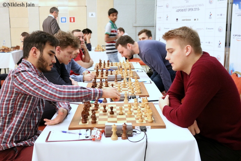 Top board clash between Vladislav Kovalev and Amin Tabatabaei
