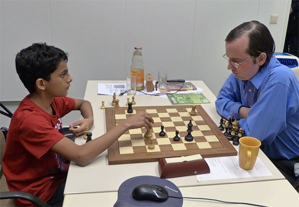 Nihal Sarin discussing an endgame with Karsten Mueller