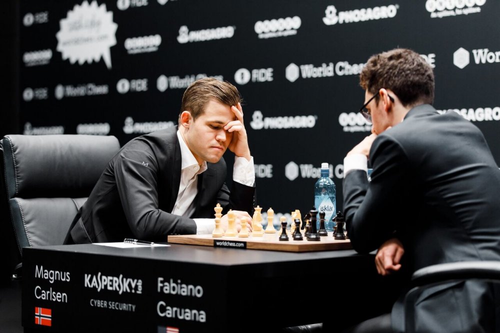 Magnus Carlsen and Fabiano Caruana play to bloodless draw in Game 4 – as it  happened, World Chess Championship 2018