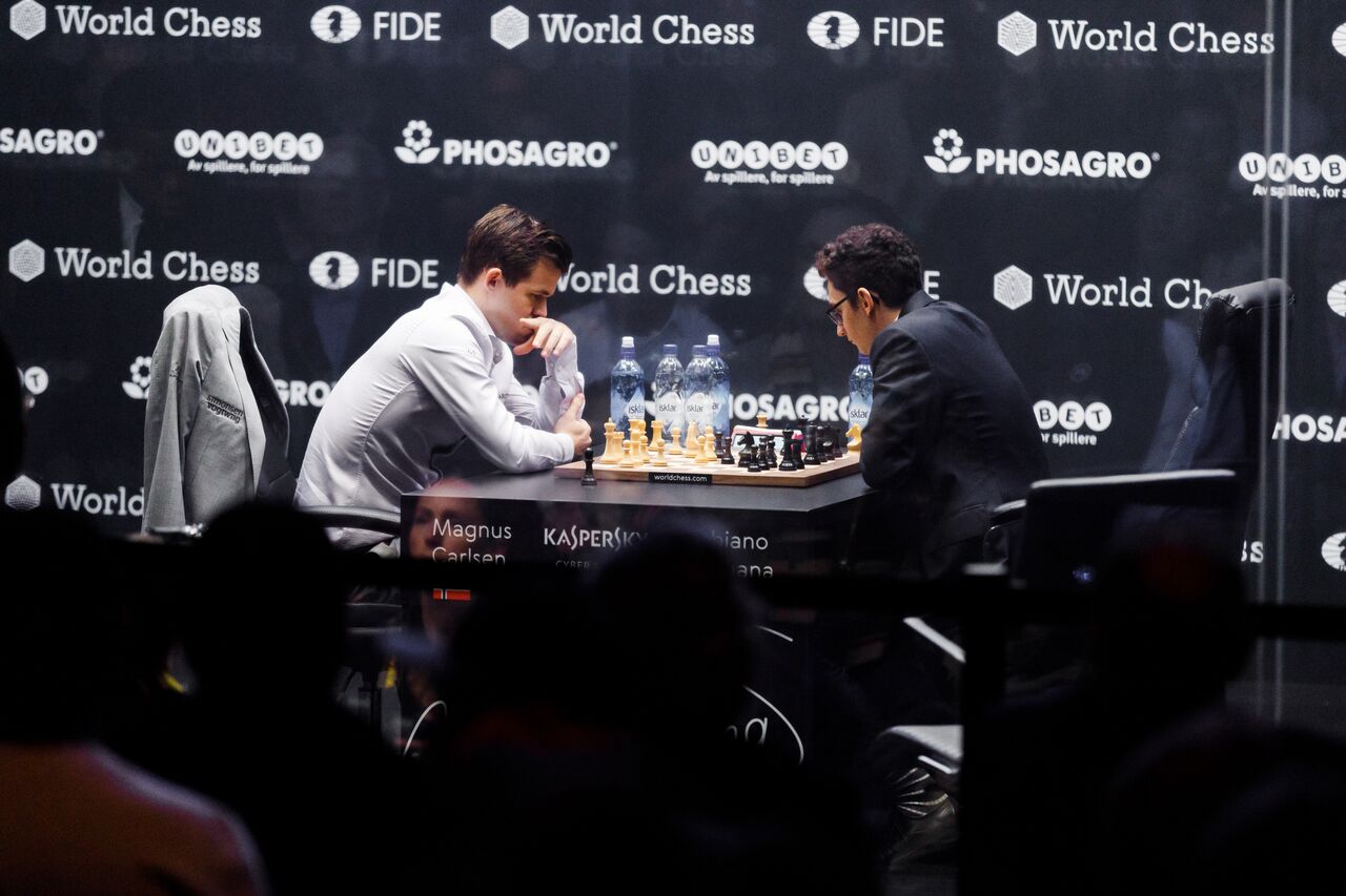Magnus Carlsen beats Fabiano Caruana in world chess championship play-off  after 12 draws - ABC News