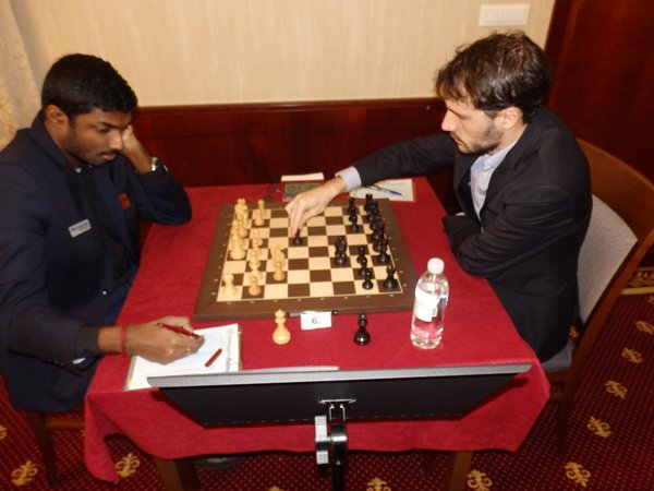 Adhiban playing against Ivan Cheparinov during the penultimate round of the Tournament of Peace