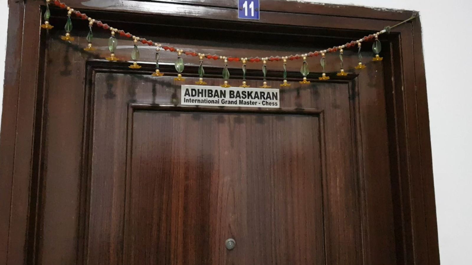The main door of Adhiban Baskaran's apartment