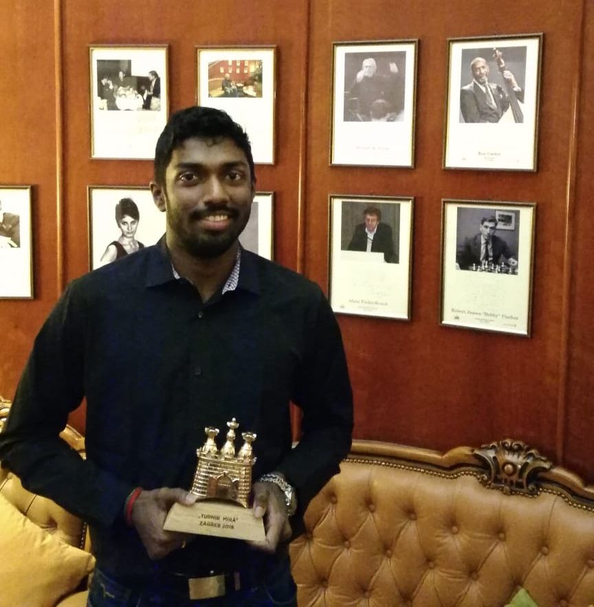 Adhiban with his trophy