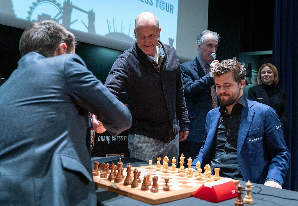 Woody Harrelson, Levon Aronian, Magnus Carlsen