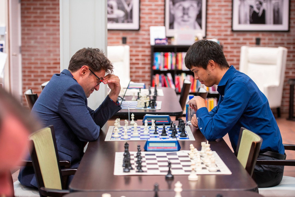 Caruana completes chaotic comeback in time trouble to win St
