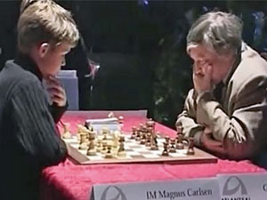 13-Year-Old Magnus Carlsen Gets Bored During A Chess Game With Grandmaster  Kasparov in 2004