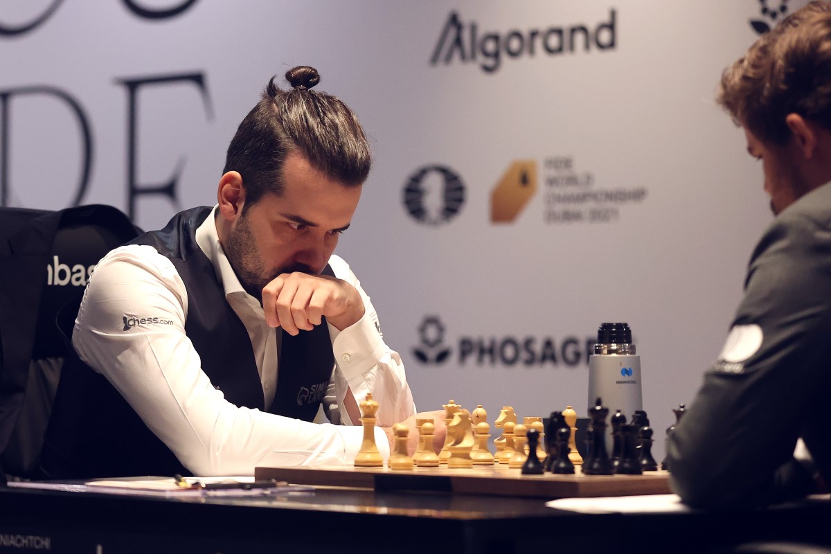 World Chess Championship Game 5: Caruana's Surprise Gambit Doesn't Break  Impasse 